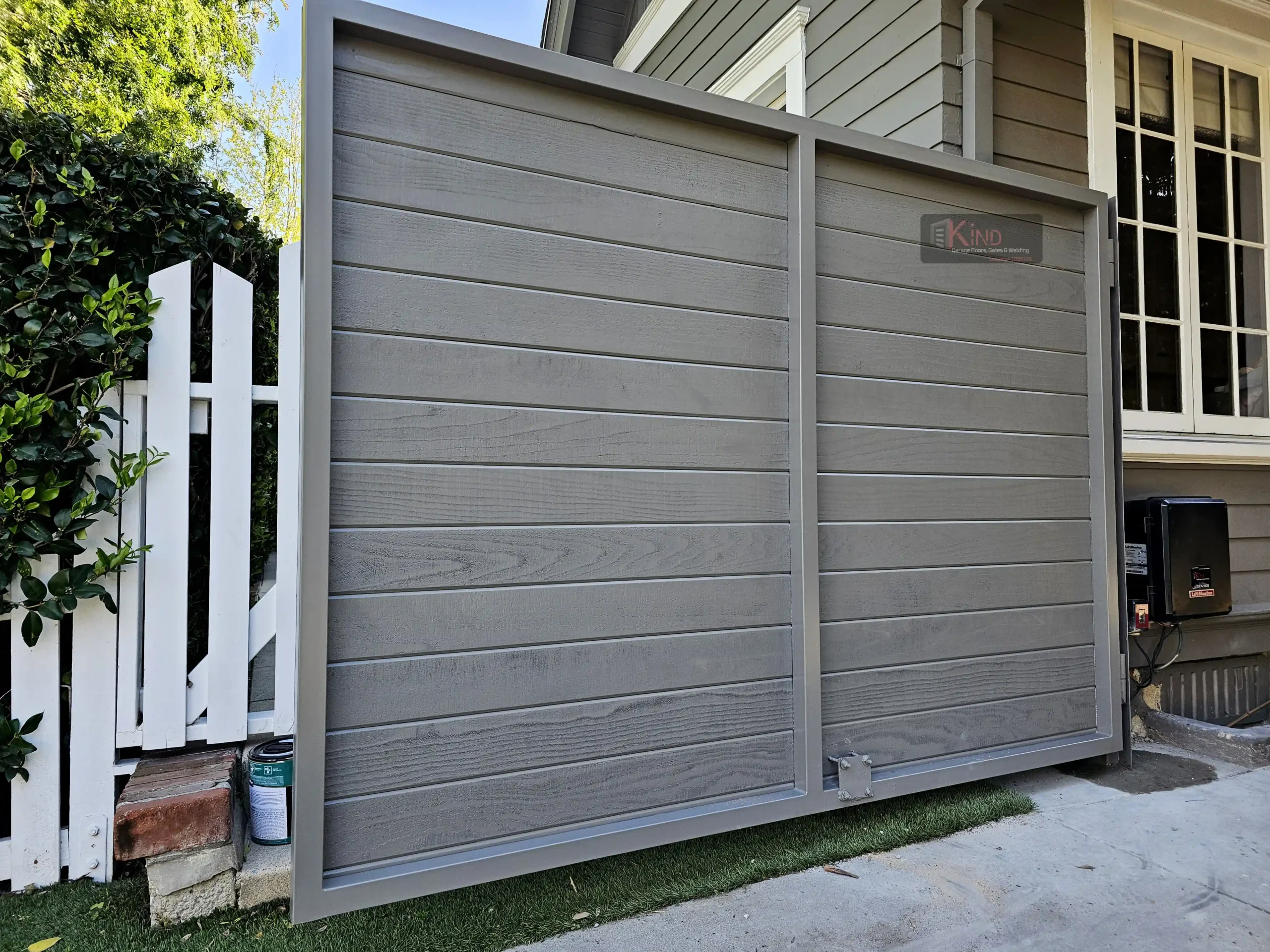 Professional carrying out Electric Gate Repair on sliding gate track system
